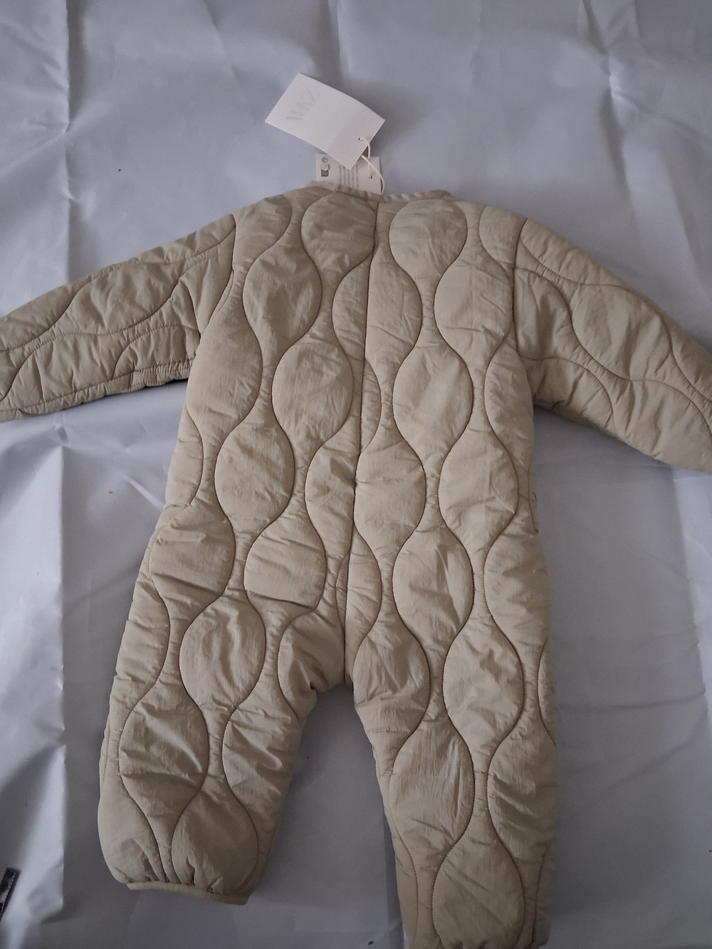 Zara Quilted One-Piece Footie in Beige